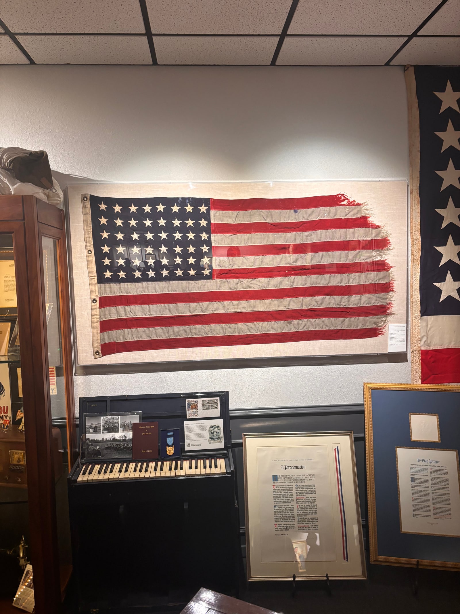 Historic American flag and artifacts displayed during a Plano Young Republicans visit to WallBuilders
